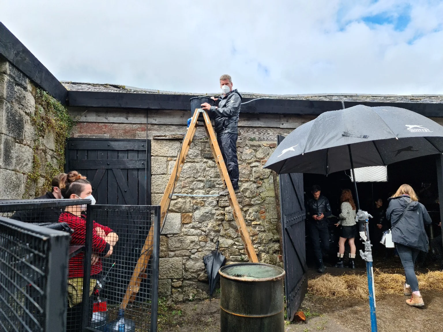 Crew rigging equipment on a film set